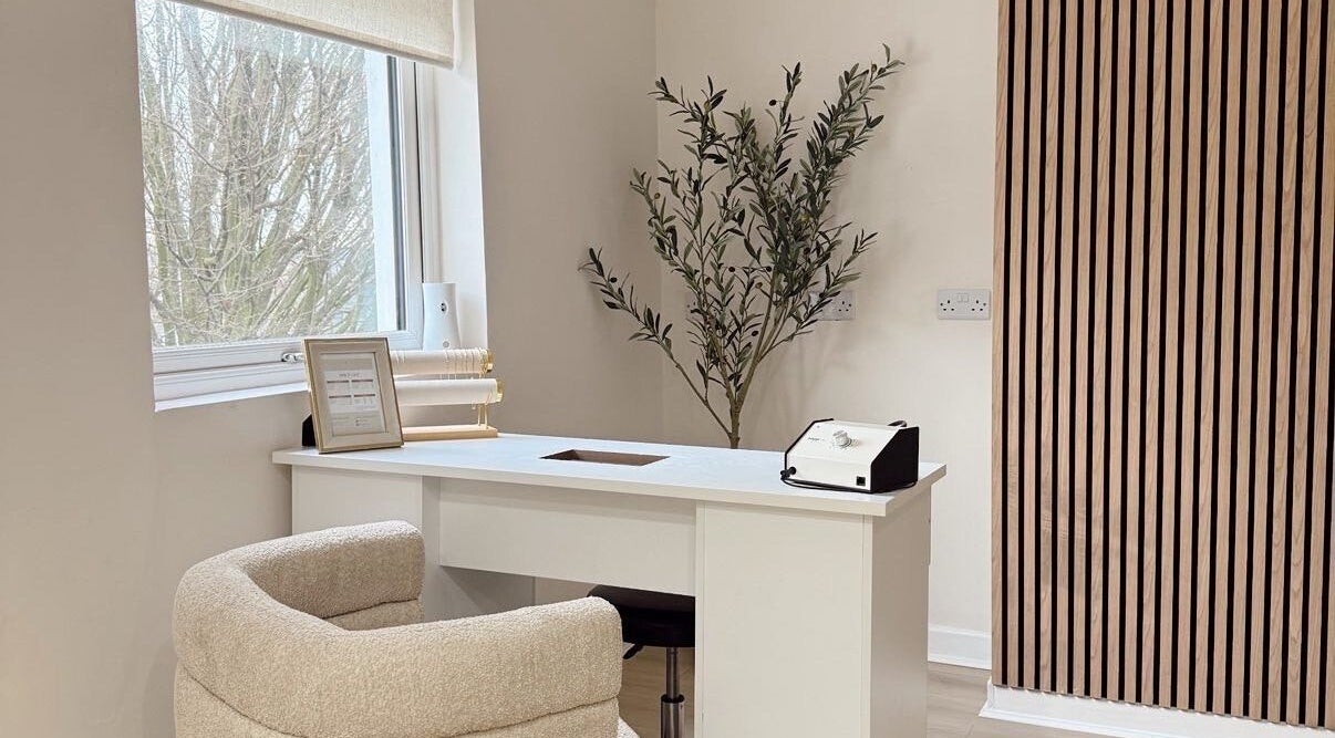 Modern spa corner at Mish Beauty, Stoke-on-Trent, England, GB featuring elegant desk and seating.