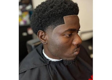 Modern fade haircut at Fanhouse in Austin, Texas, US, showcasing precision and style.
