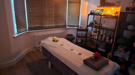 Relaxing massage room at Nattavadee Ann Thai Therapy Massage in Addlestone, England, GB with a serene setup.