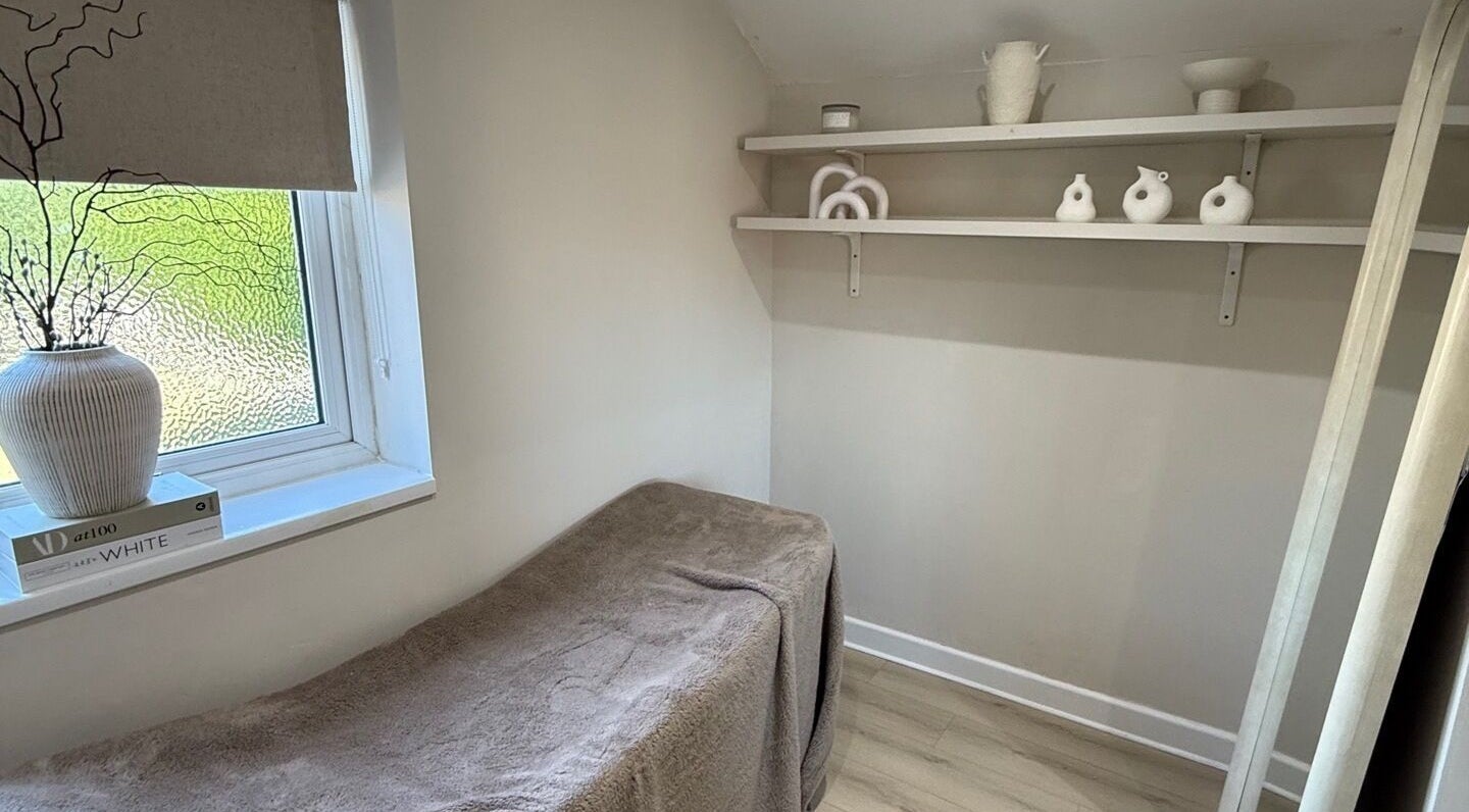 Cozy treatment room at BySamantha in Stoke-on-Trent, England, GB, with soft lighting and elegant decor.
