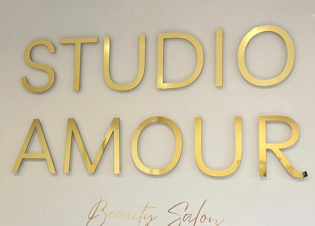 Gold lettering displays 'Studio Amour' at BySamantha in Stoke-on-Trent, England, GB.