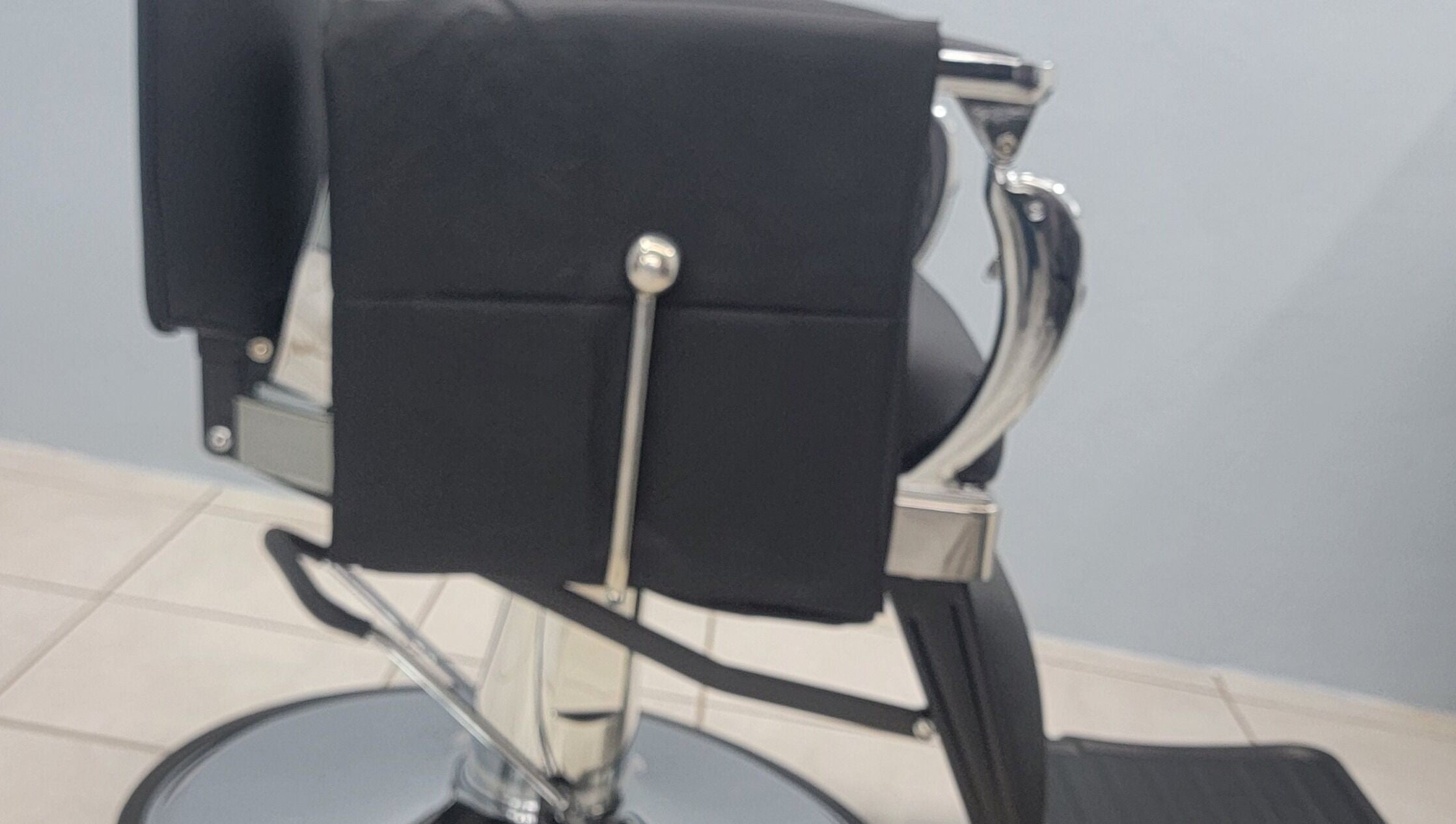 Elegant salon chair at The Alumni, Couva-tabaquite-talparo Regional Corporation, TT, enhancing the client experience.