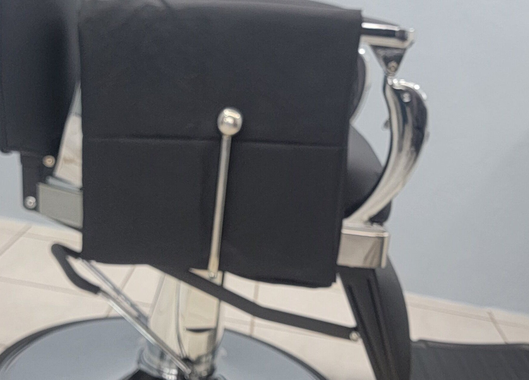 Elegant salon chair at The Alumni, Couva-tabaquite-talparo Regional Corporation, TT, enhancing the client experience.