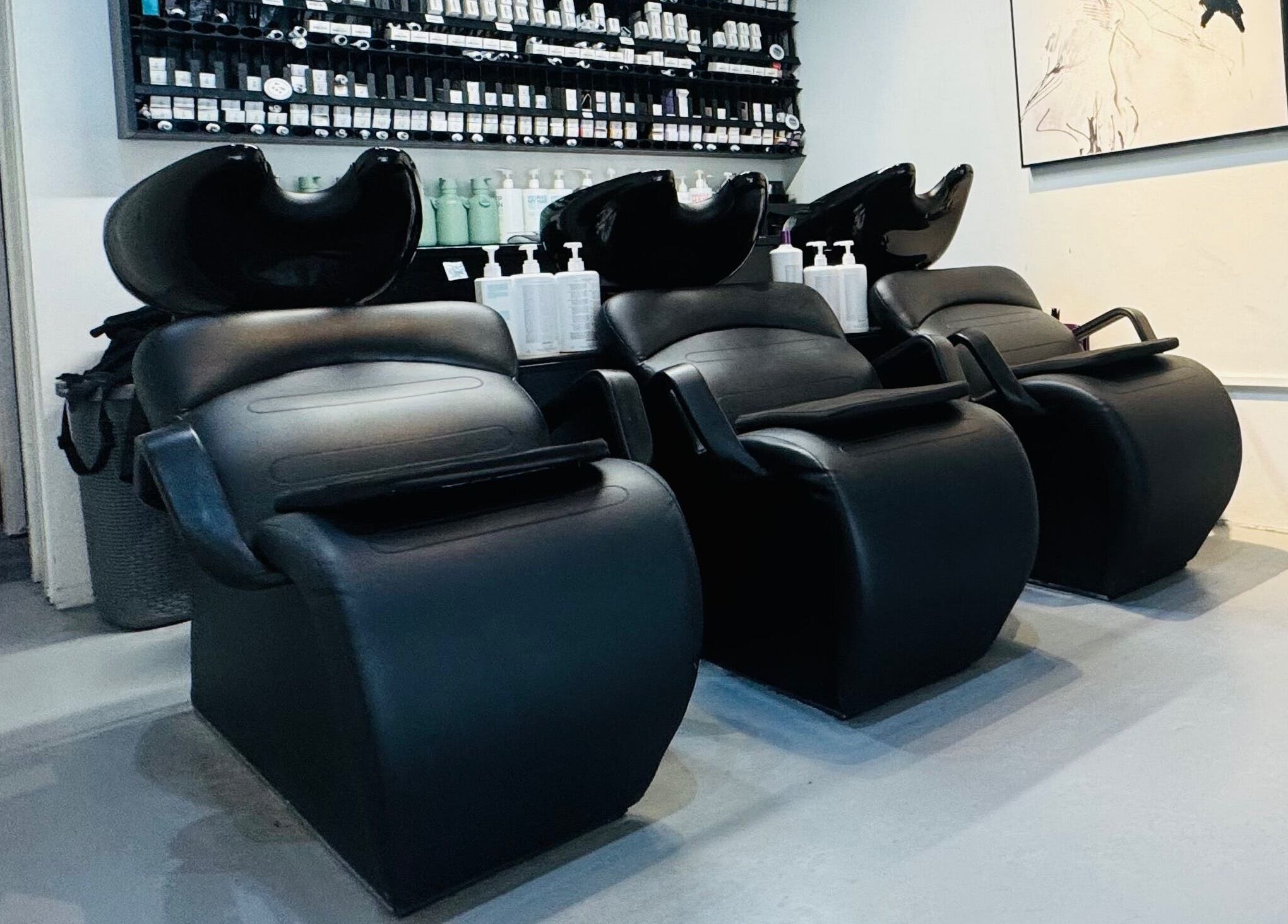 Elegant wash stations at Hair by Sa, Surry Hills, New South Wales, AU ready for relaxing hair treatments.