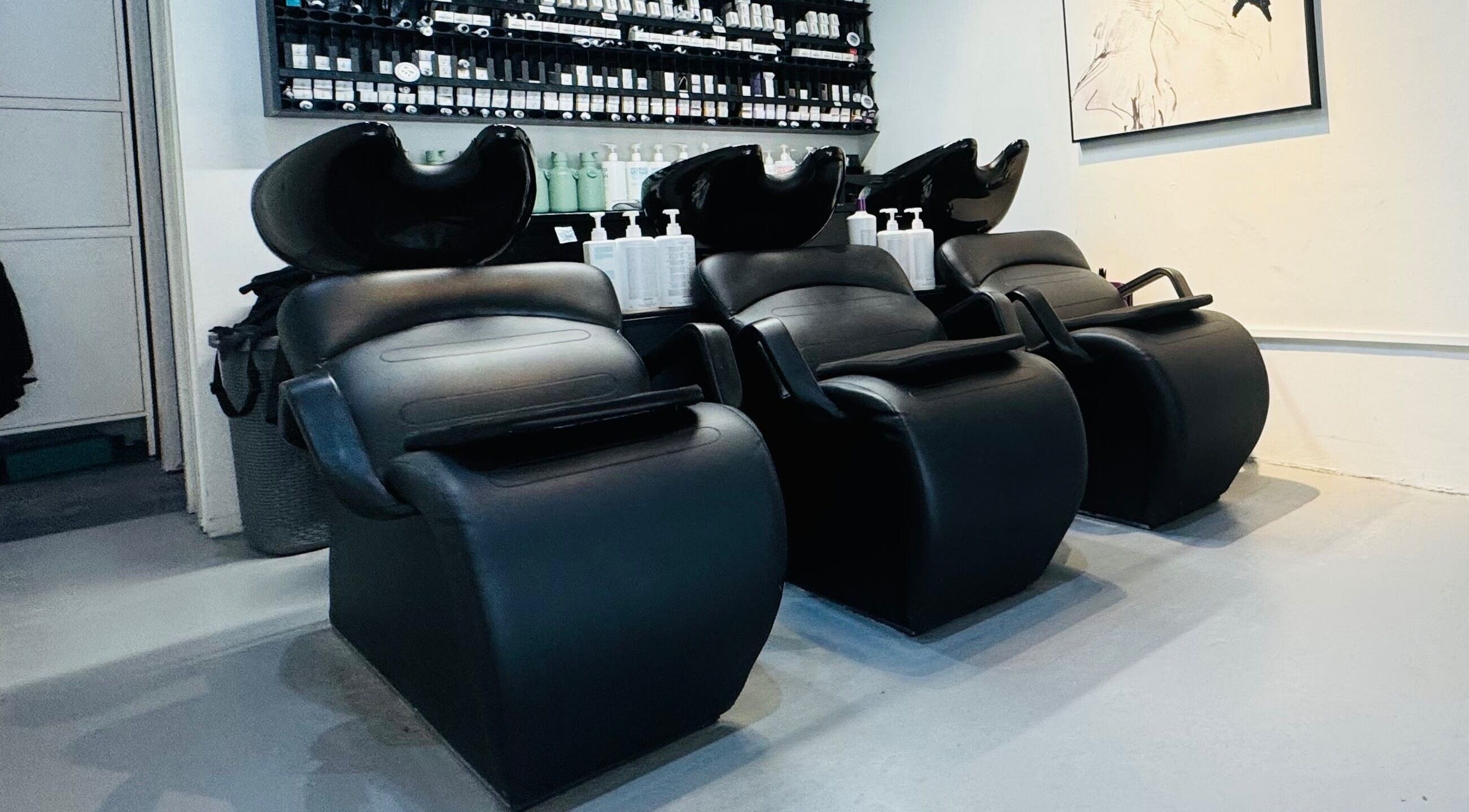 Elegant wash stations at Hair by Sa, Surry Hills, New South Wales, AU ready for relaxing hair treatments.