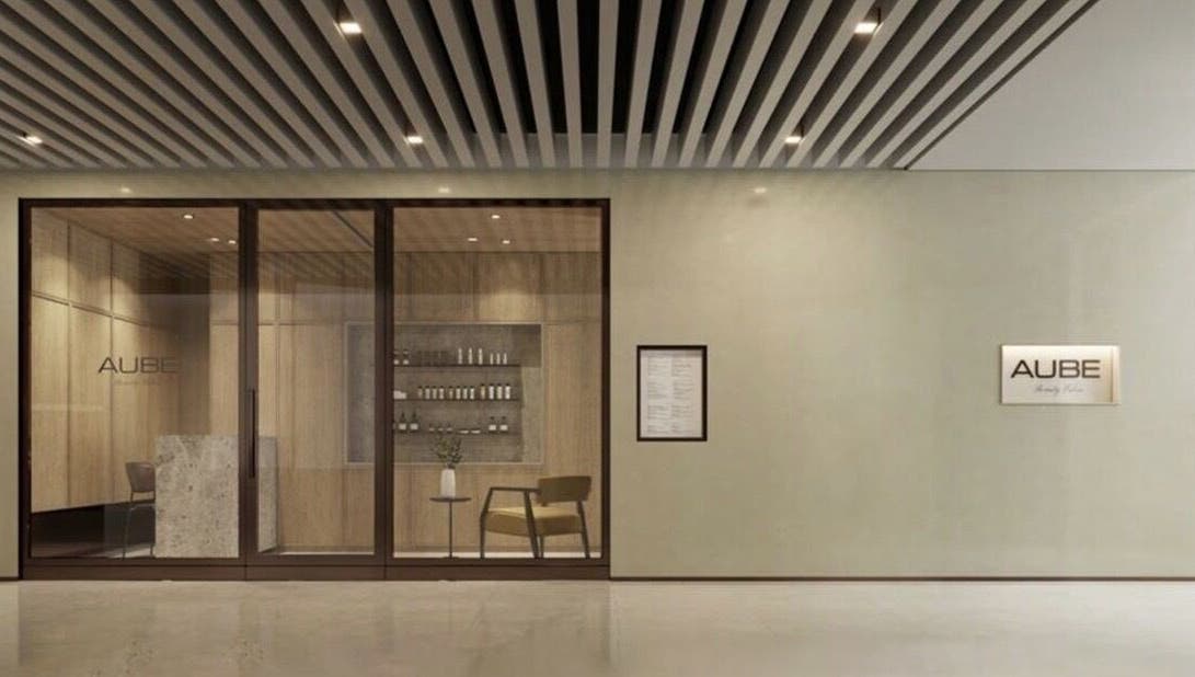 Entrance of AUBE Clarke Quay Central beauty salon, Singapore, SG with sleek interior design.