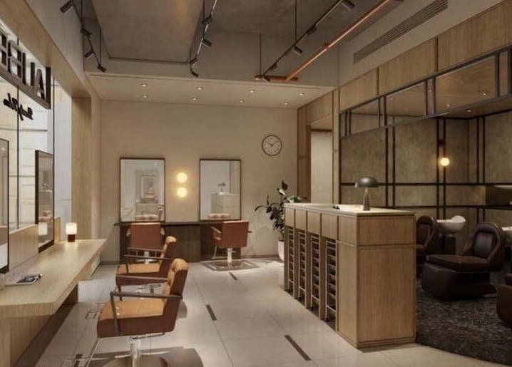 AUBE Clarke Quay Central in Singapore, SG, featuring a stylish, modern interior with elegant salon chairs and decor.