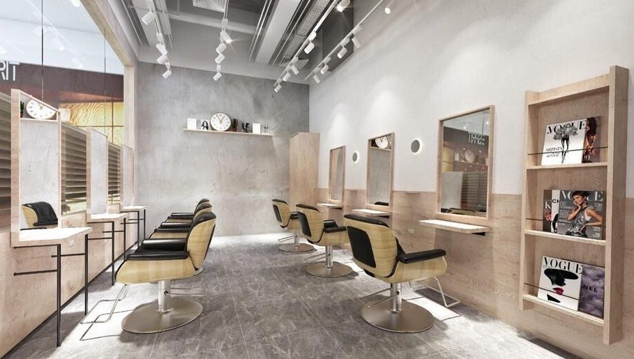 Modern salon interior at AUBE Somerset, Singapore, Singapore, SG, showcasing sleek design and comfortable styling chairs.