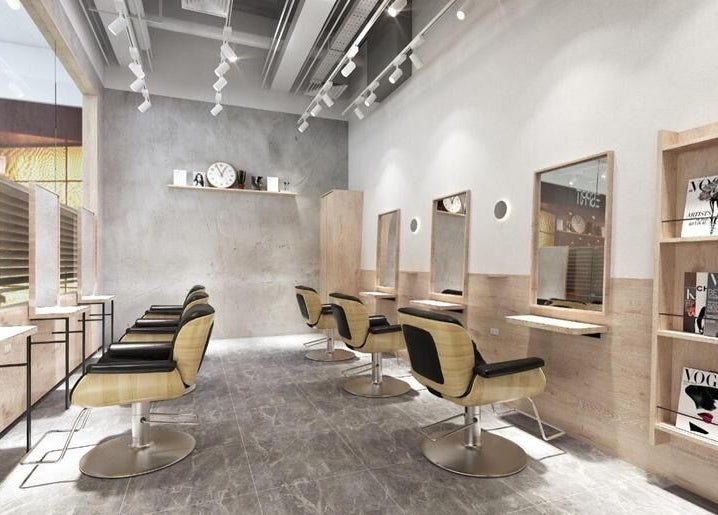 Modern salon interior at AUBE Somerset, Singapore, Singapore, SG, showcasing sleek design and comfortable styling chairs.