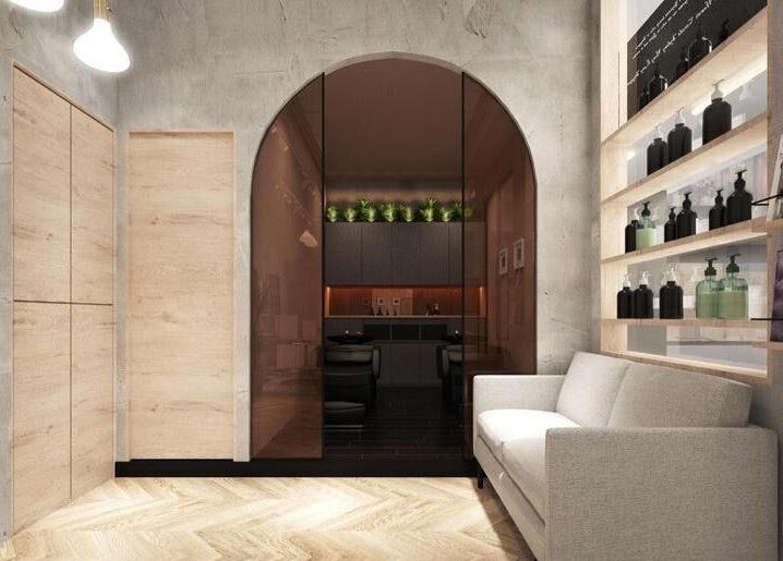 Modern salon interior at AUBE Somerset, Singapore, featuring stylish decor and cozy seating for a relaxing visit.