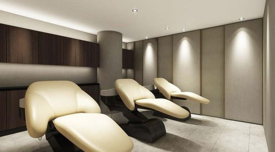 Luxurious spa chairs in AUBE Wheelock Place, Singapore, SG offering a serene wellness experience.