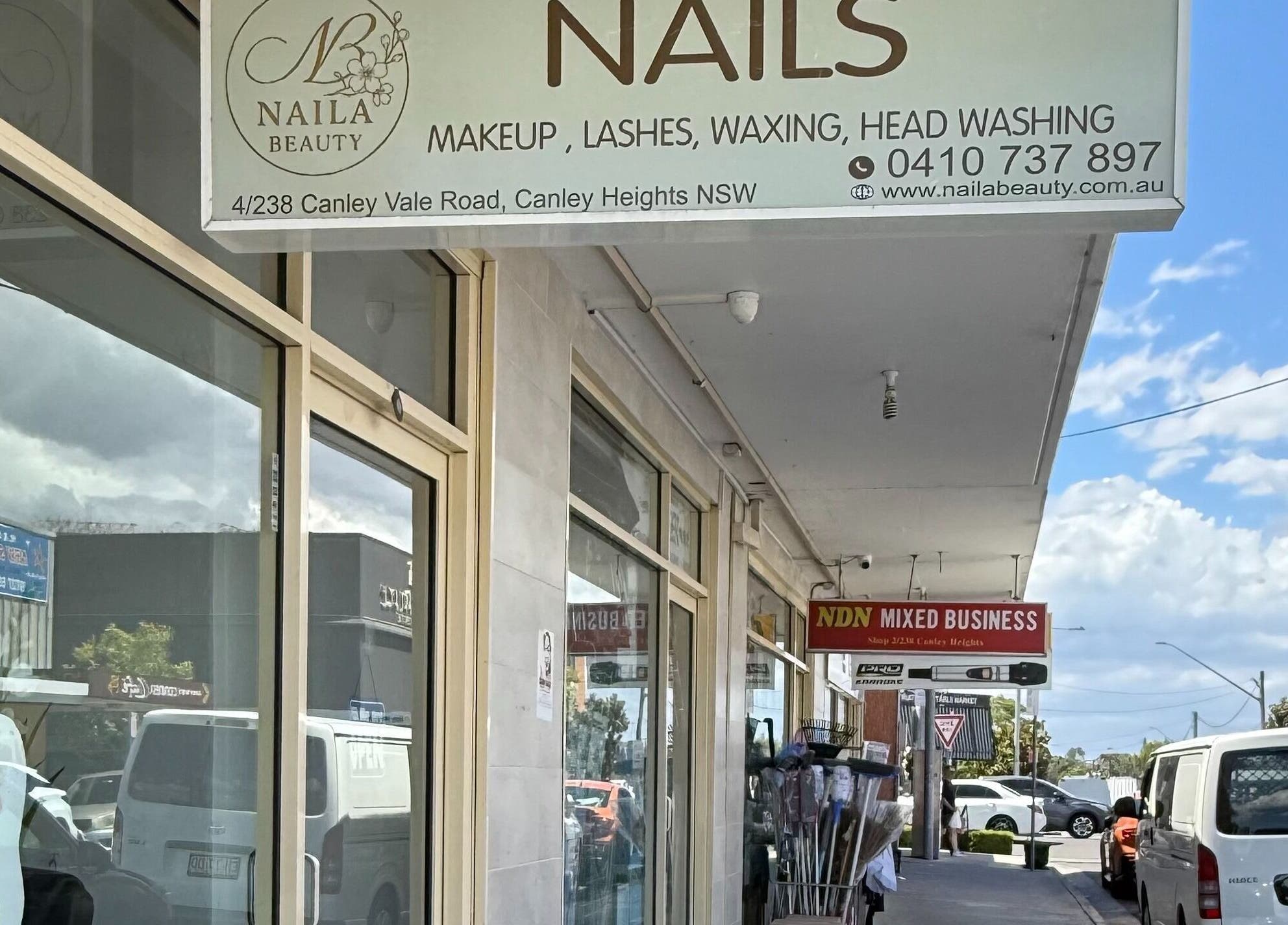 Exterior view of Naila Beauty in Canley Heights, New South Wales, featuring signage and storefront.