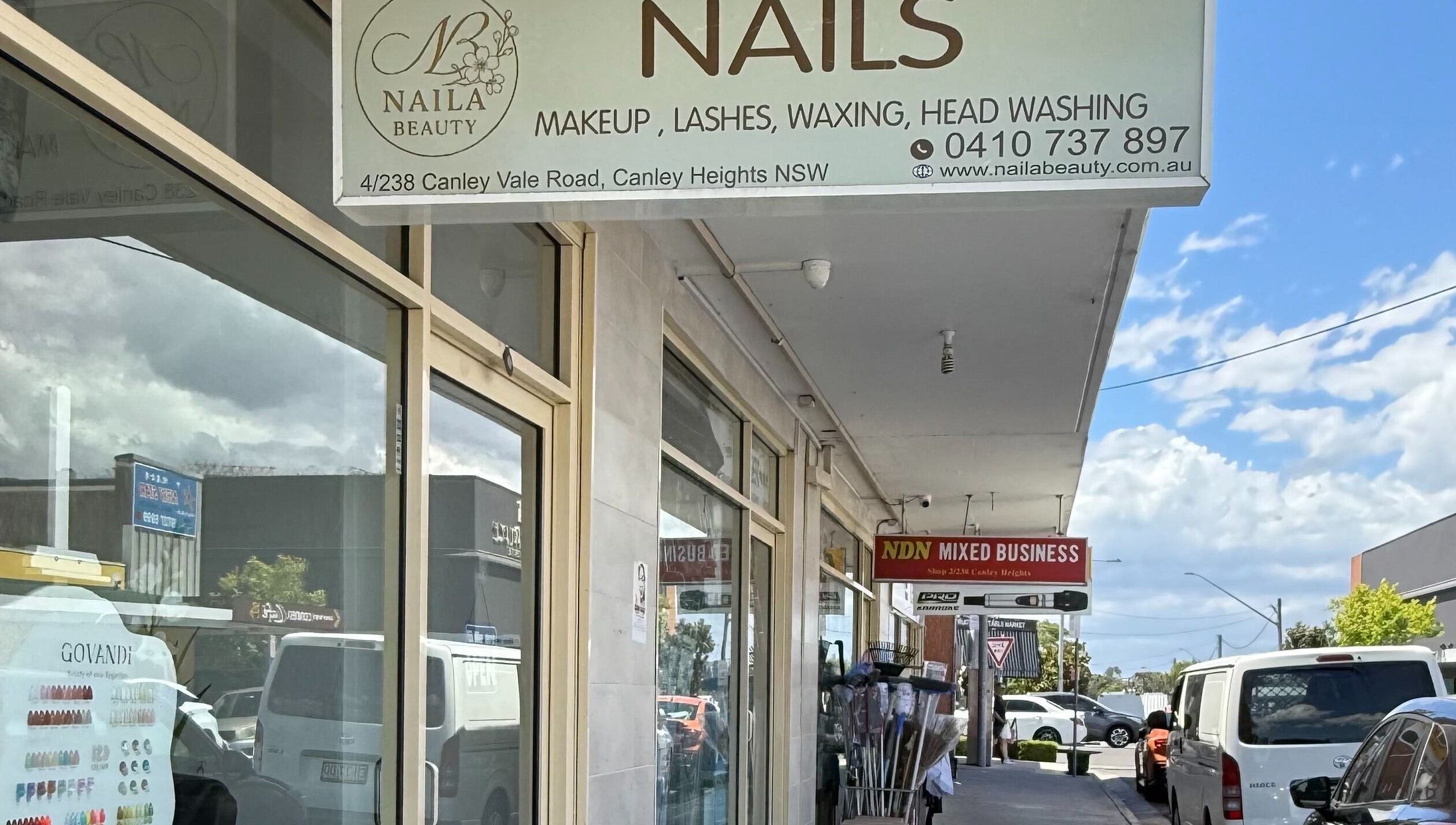 Naila Beauty shopfront in Canley Heights, New South Wales, AU showcases beauty services signage.