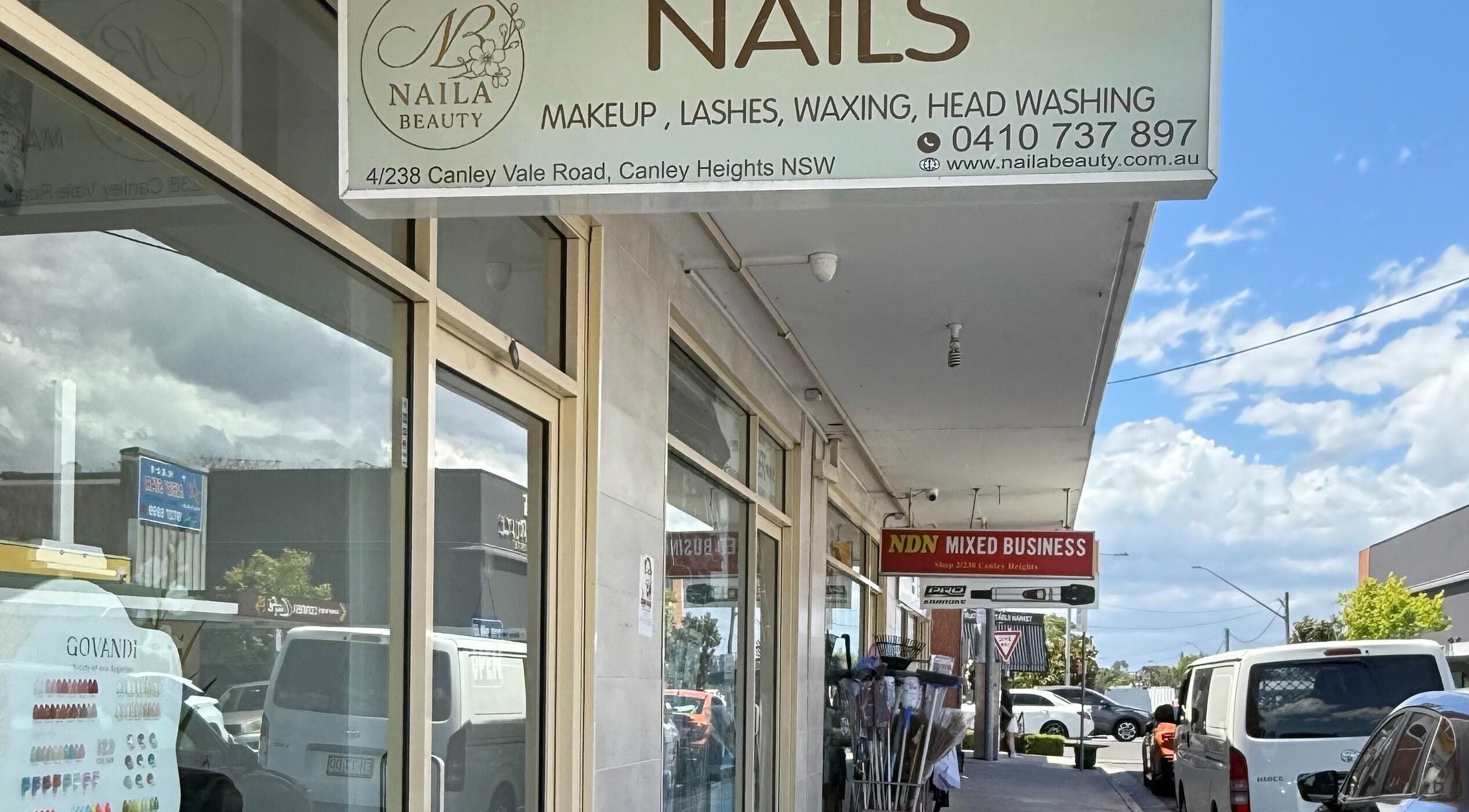 Naila Beauty shopfront in Canley Heights, New South Wales, AU showcases beauty services signage.