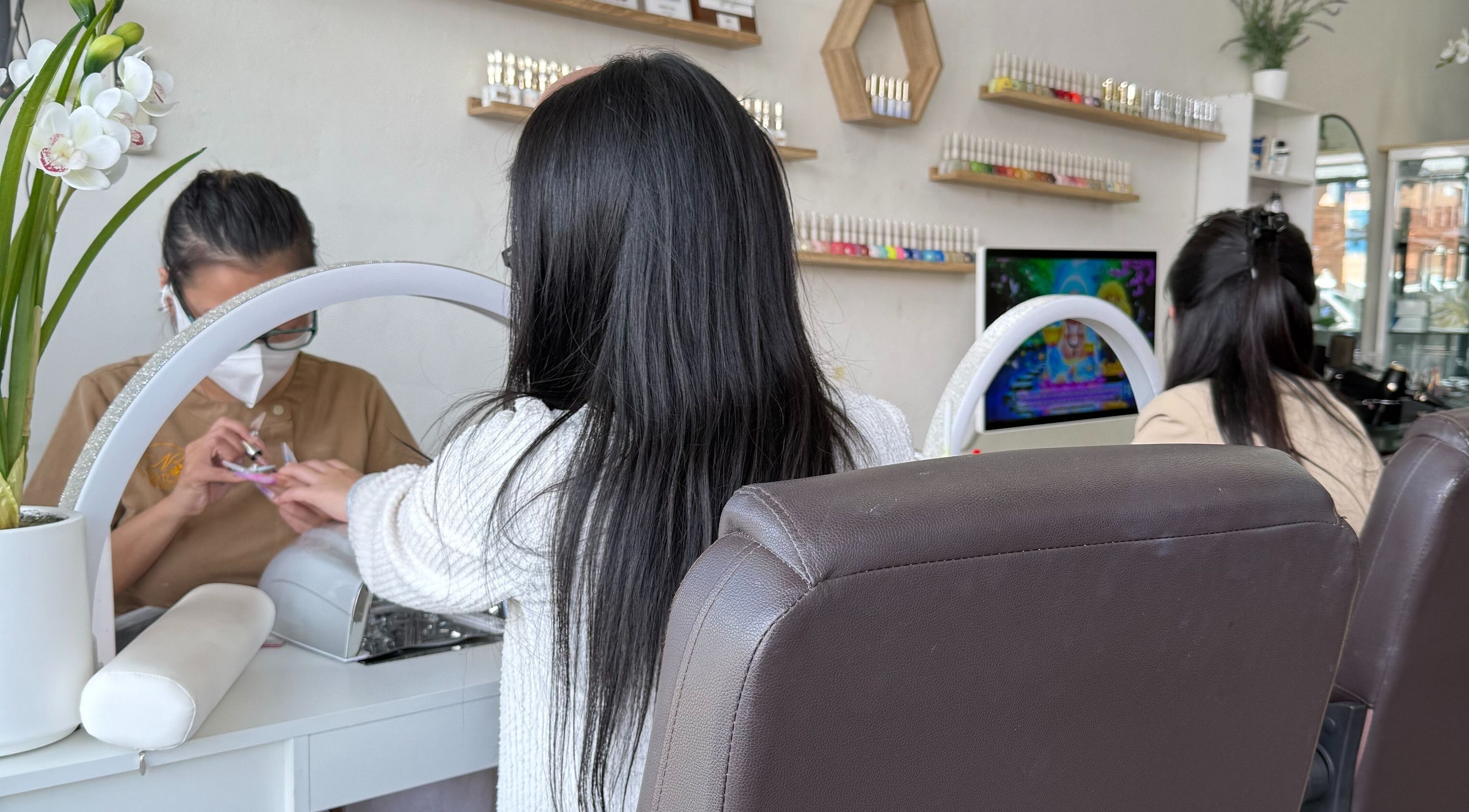 Naila Beauty nail session in Canley Heights, New South Wales, AU showcasing client getting manicure.