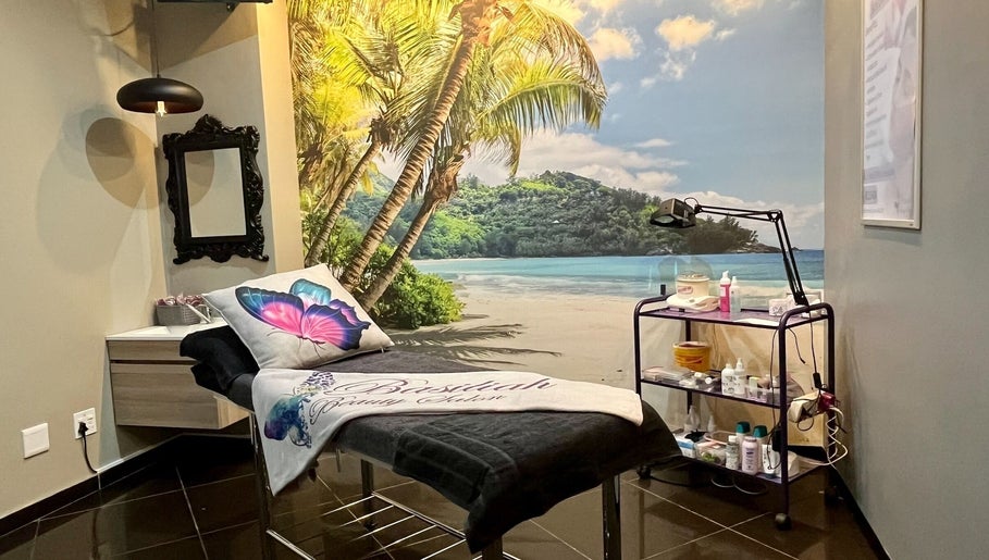 Relaxing treatment room at Basiliah Beauty Salon Tan Can, Pretoria, Gauteng, ZA with tropical beach mural.