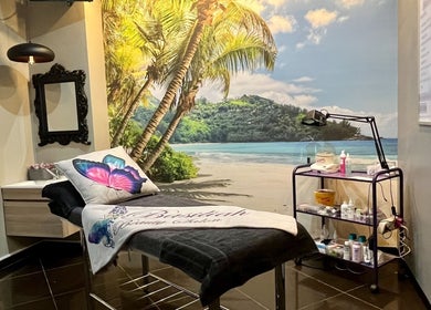 Relaxing treatment room at Basiliah Beauty Salon Tan Can, Pretoria, Gauteng, ZA with tropical beach mural.