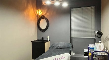 Cozy treatment room at Basiliah Beauty Salon Tan Can, Pretoria, Gauteng, ZA with ambient lighting decor.