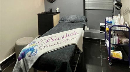 Cozy treatment room at Basiliah Beauty Salon Tan Can in Pretoria, Gauteng, ZA with a massage table and spa essentials.