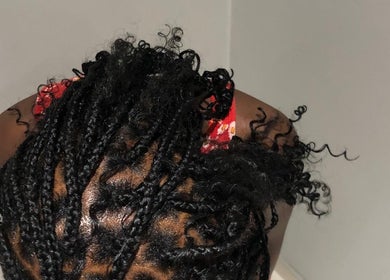 Intricate braided hairstyle at BRILLO BONITA EMPIRE, Windhoek, Khomas Region, NA.