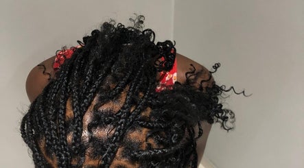 Intricate braided hairstyle at BRILLO BONITA EMPIRE, Windhoek, Khomas Region, NA.