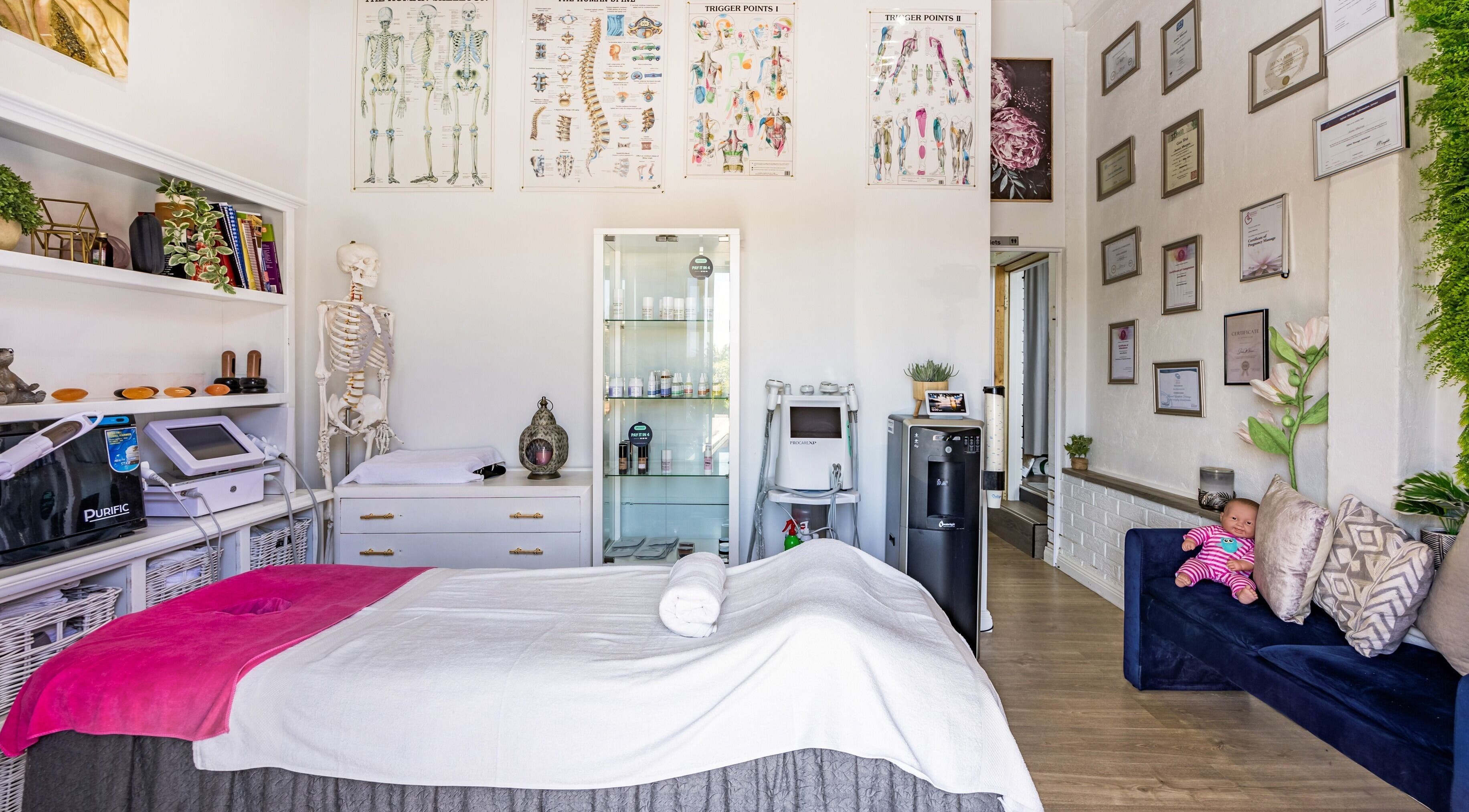 Cozy therapy room at Blossom Remedial Therapist, Melbourne, Victoria, AU with a massage table and decor.