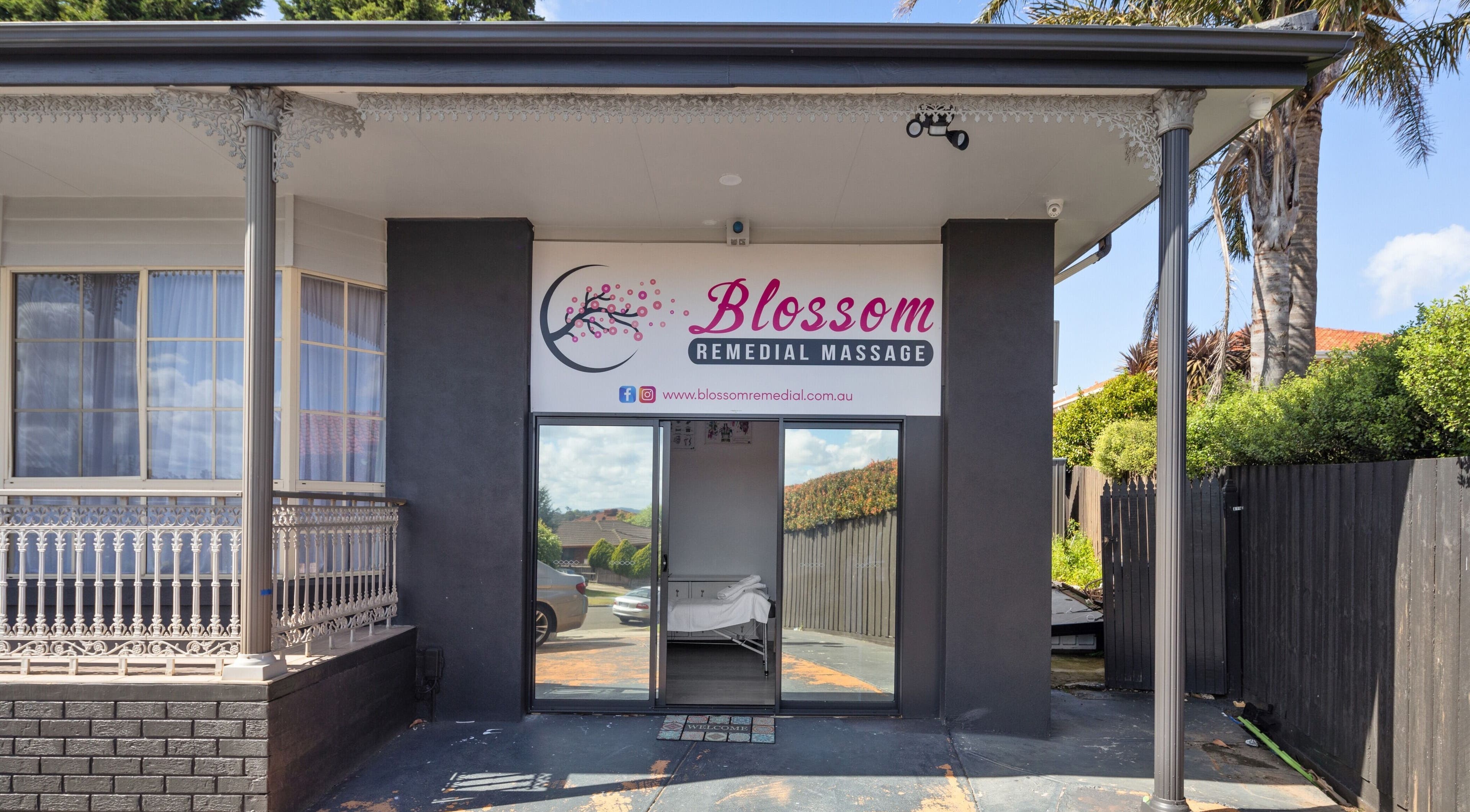 Front entrance of Blossom Remedial Therapist in Melbourne, Victoria, AU featuring a welcoming sign.