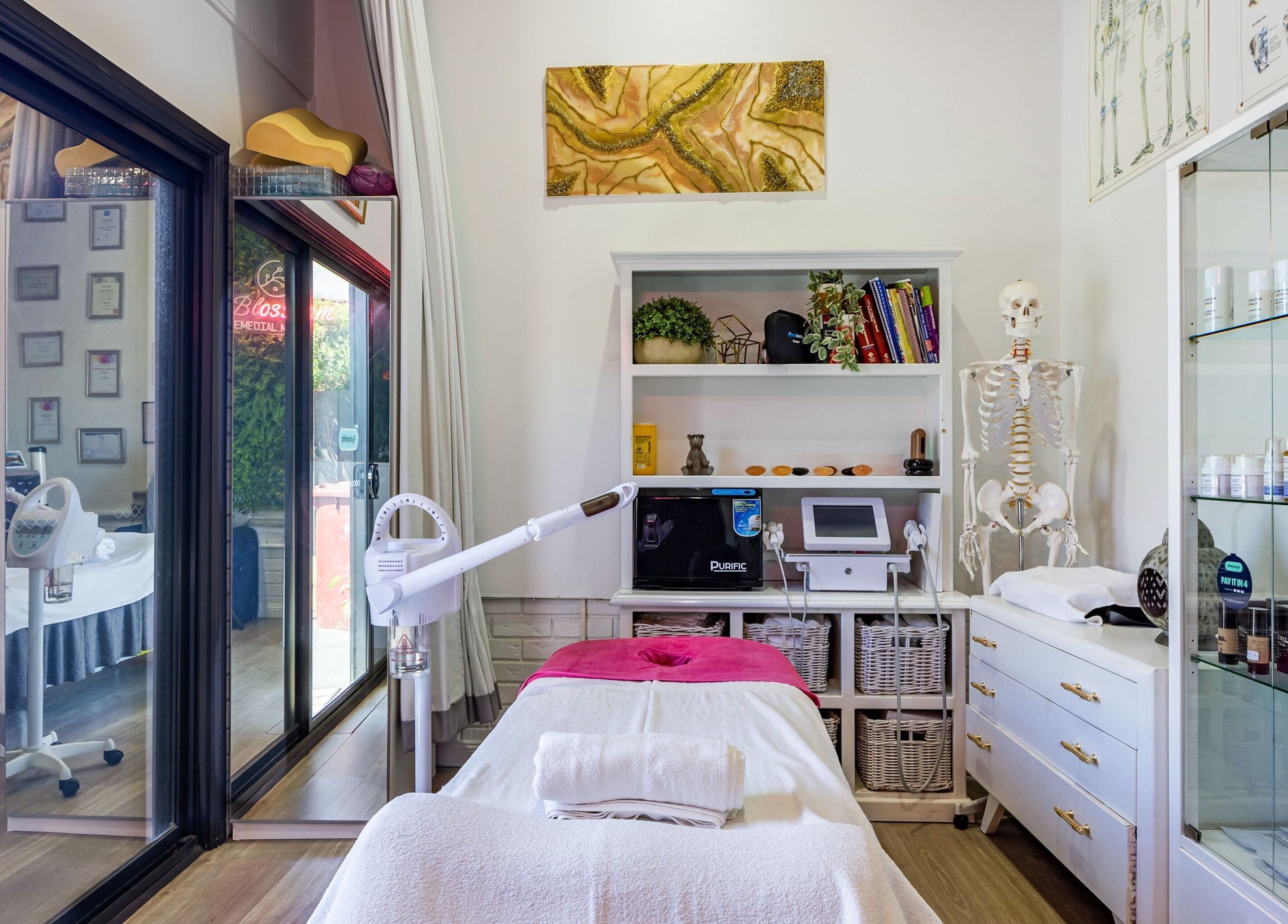 Relaxing therapy room at Blossom Remedial Therapist in Melbourne, Victoria, AU, featuring modern equipment and decor.