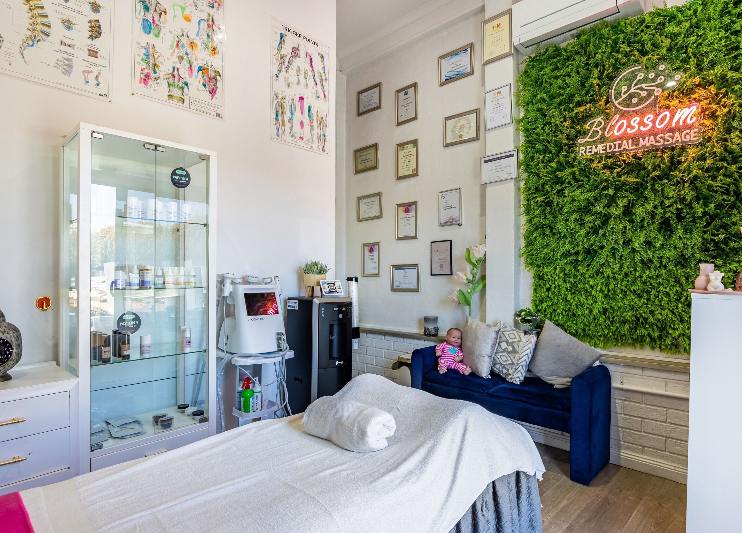 Blossom Remedial Therapist room featuring lush greenery wall, Melbourne, Victoria, AU.