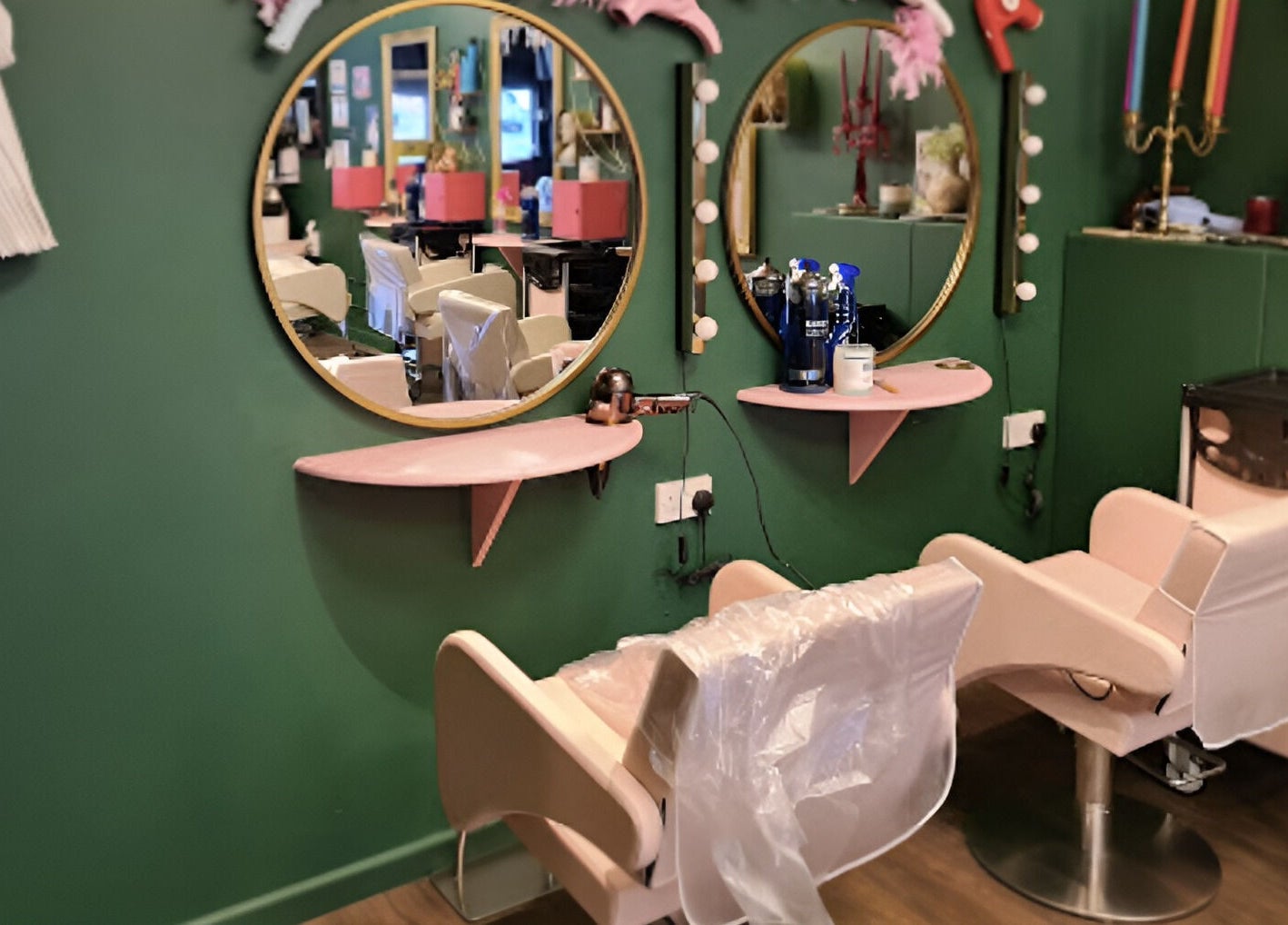 Elegant styling chairs at Beard and Blow Hairdressing Salon in Romford, England, GB, enhancing client comfort.