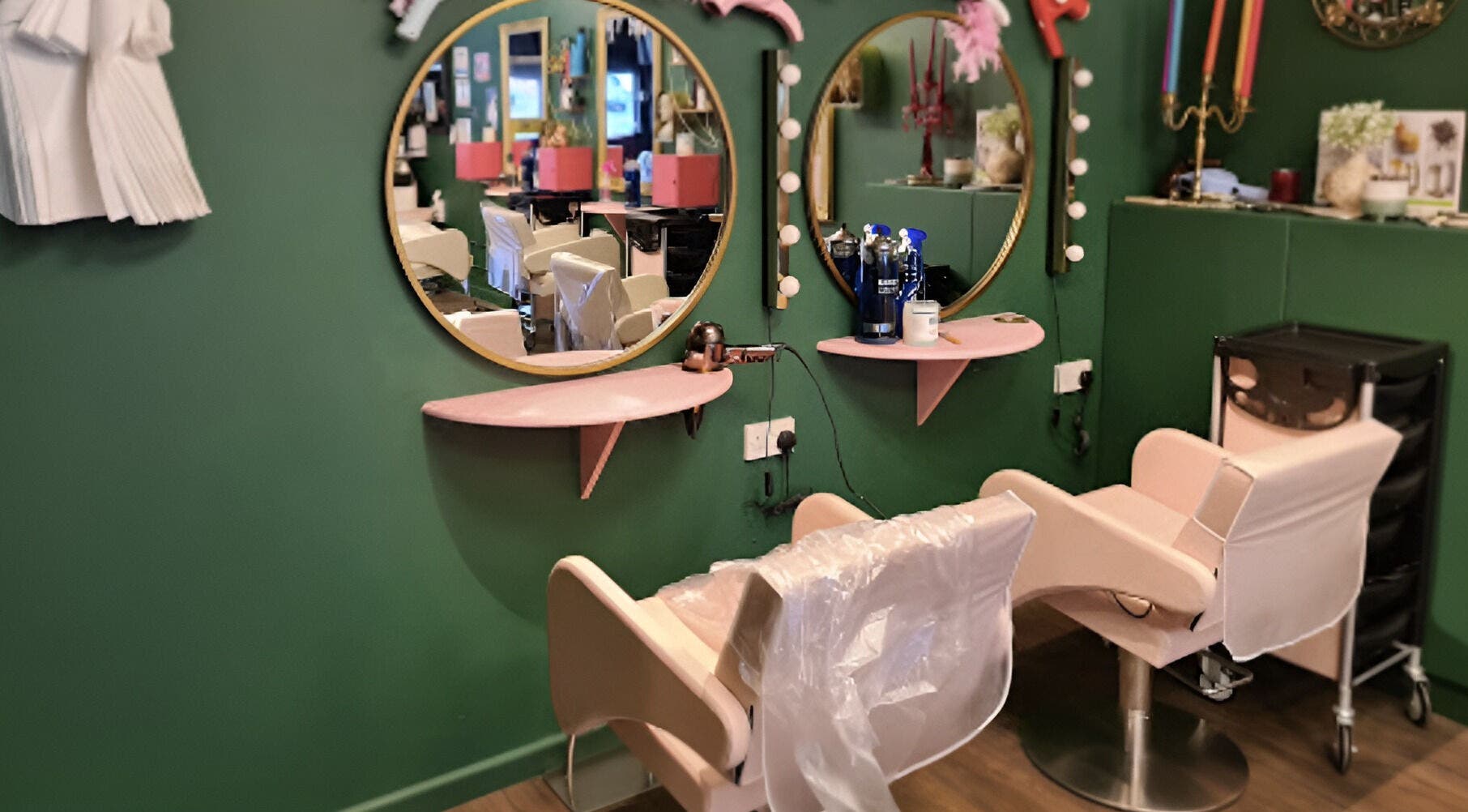 Elegant styling chairs at Beard and Blow Hairdressing Salon in Romford, England, GB, enhancing client comfort.