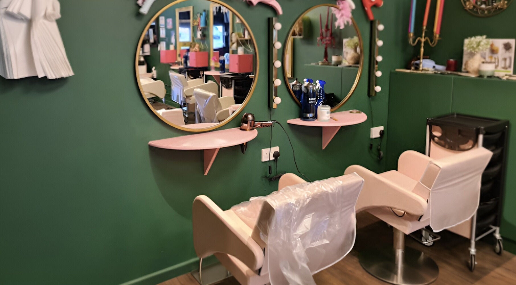 Elegant styling chairs at Beard and Blow Hairdressing Salon in Romford, England, GB, enhancing client comfort.