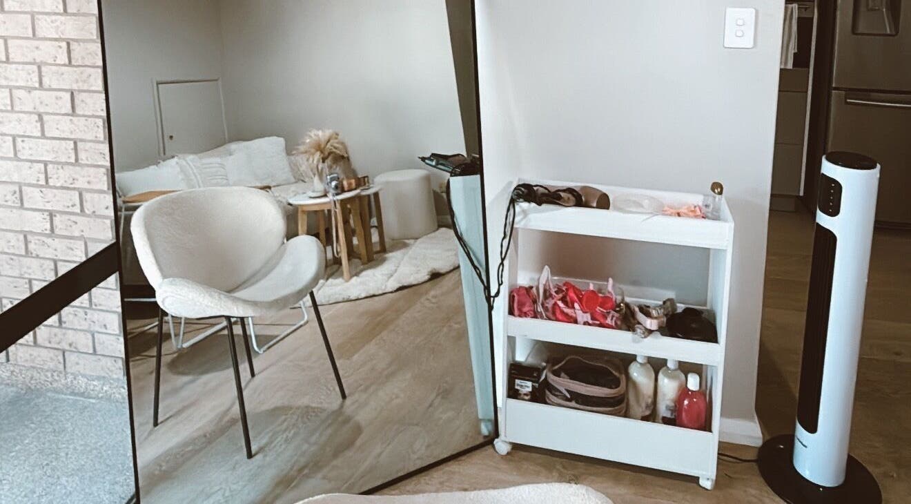 Cozy beauty corner at Emma beauty, Carlton, New South Wales, AU. Modern chair and shelves with beauty essentials.
