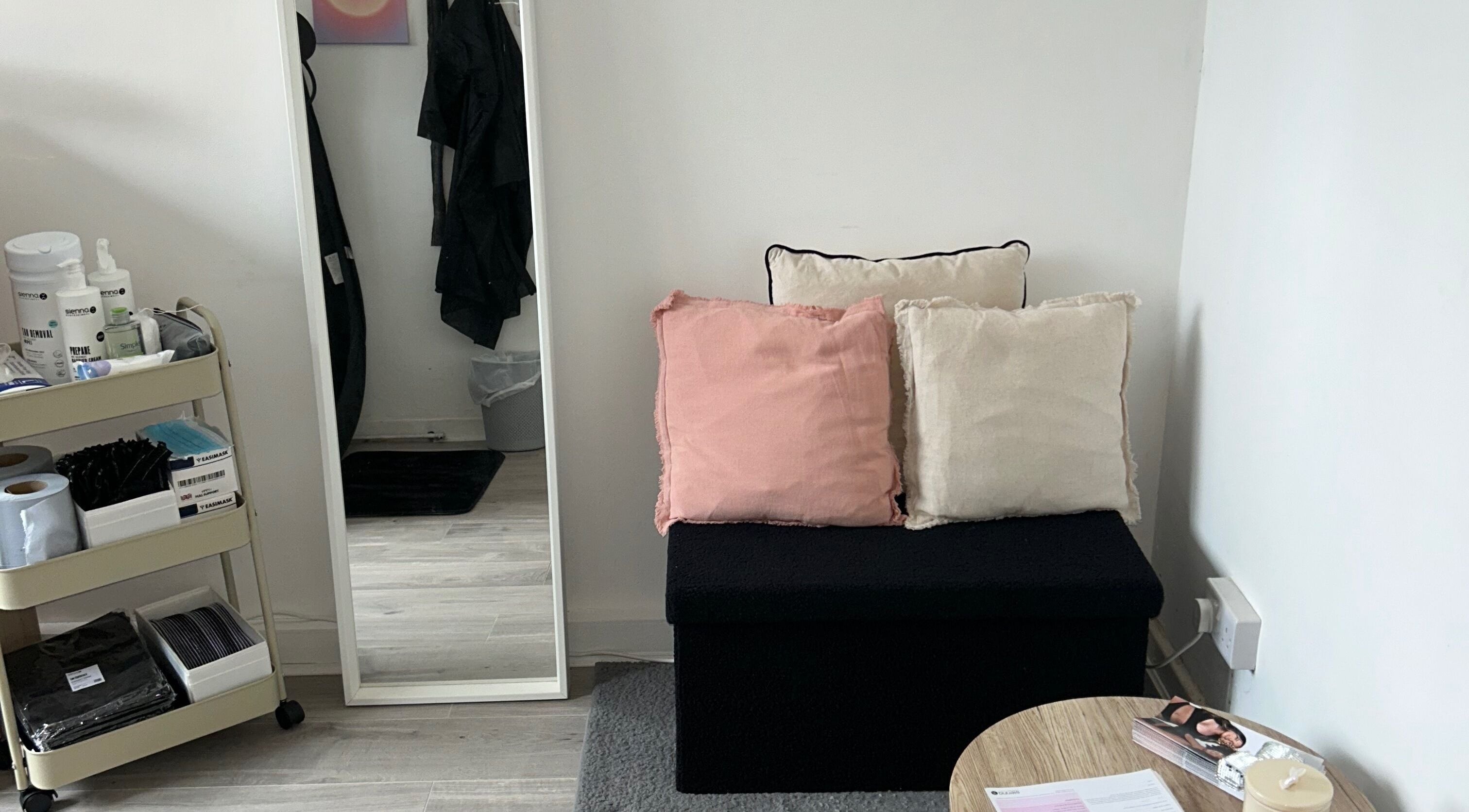 Comfortable seating and beauty products at Ell’s Glow Studio, Galley Common, England, GB.