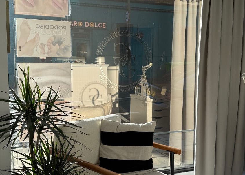 Interior of Gosh Gosh Clinic Battersea, London, England, GB with cozy seating near sunlight.