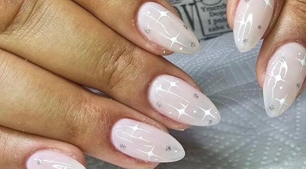 Elegant nail art design at BELIEER LUXEUESE in Pretoria, Gauteng, ZA. Featuring delicate white patterns.