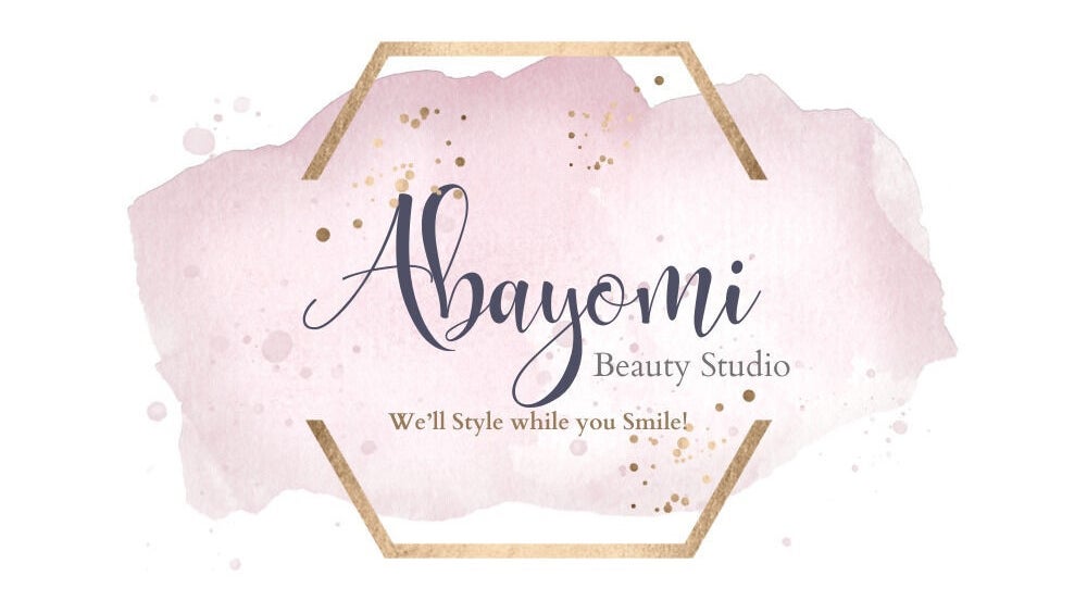Abayomi Beauty Studio logo with elegant script on pink watercolor background, Willemstad, Curaçao, CW.