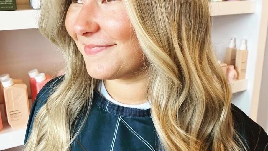 Woman with styled blonde hair at Beauty in Detail, Houston, Texas, US.