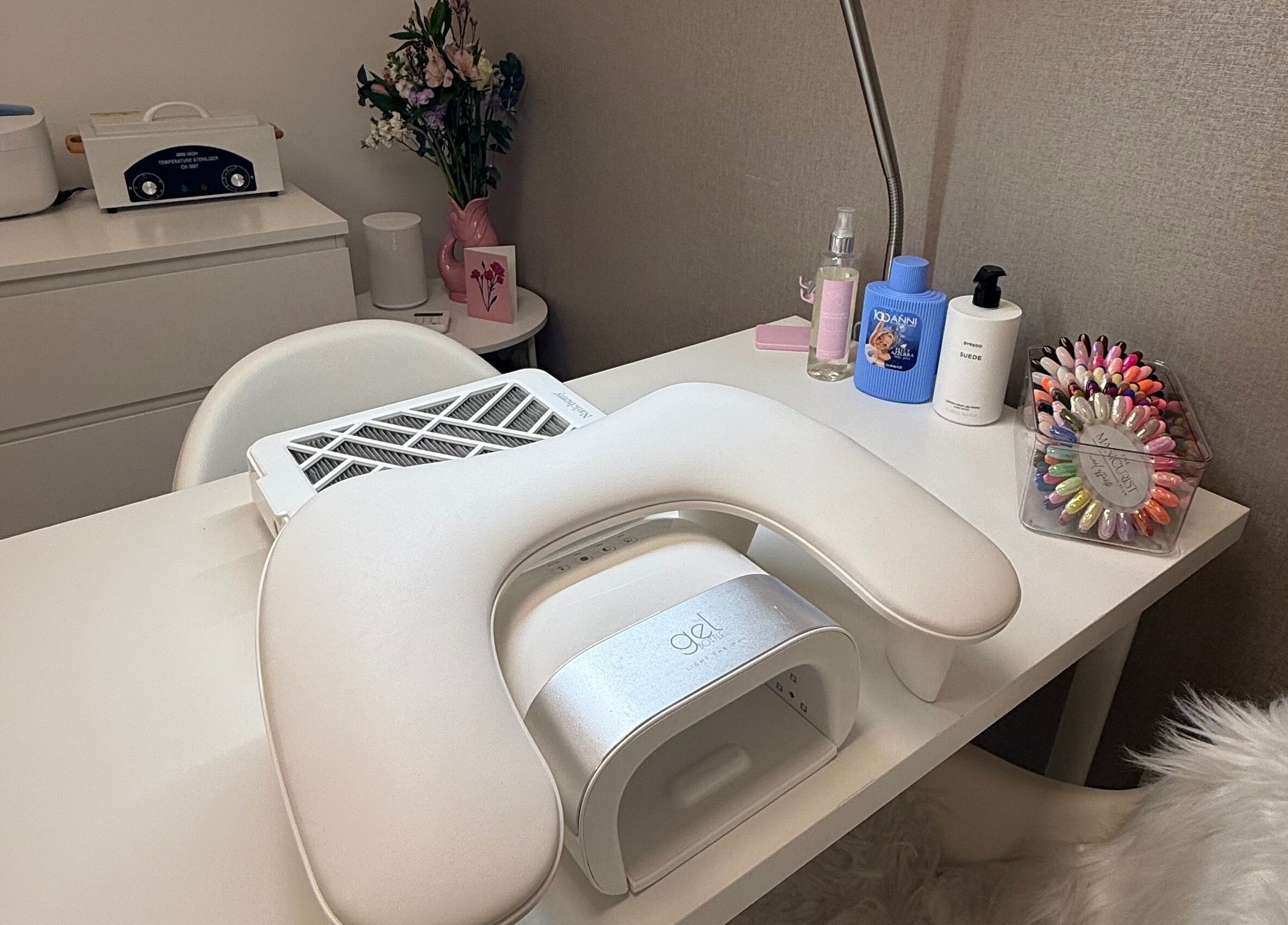 Modern manicure station at The Manicurist by CM, London, England, GB, featuring tools and polishes.