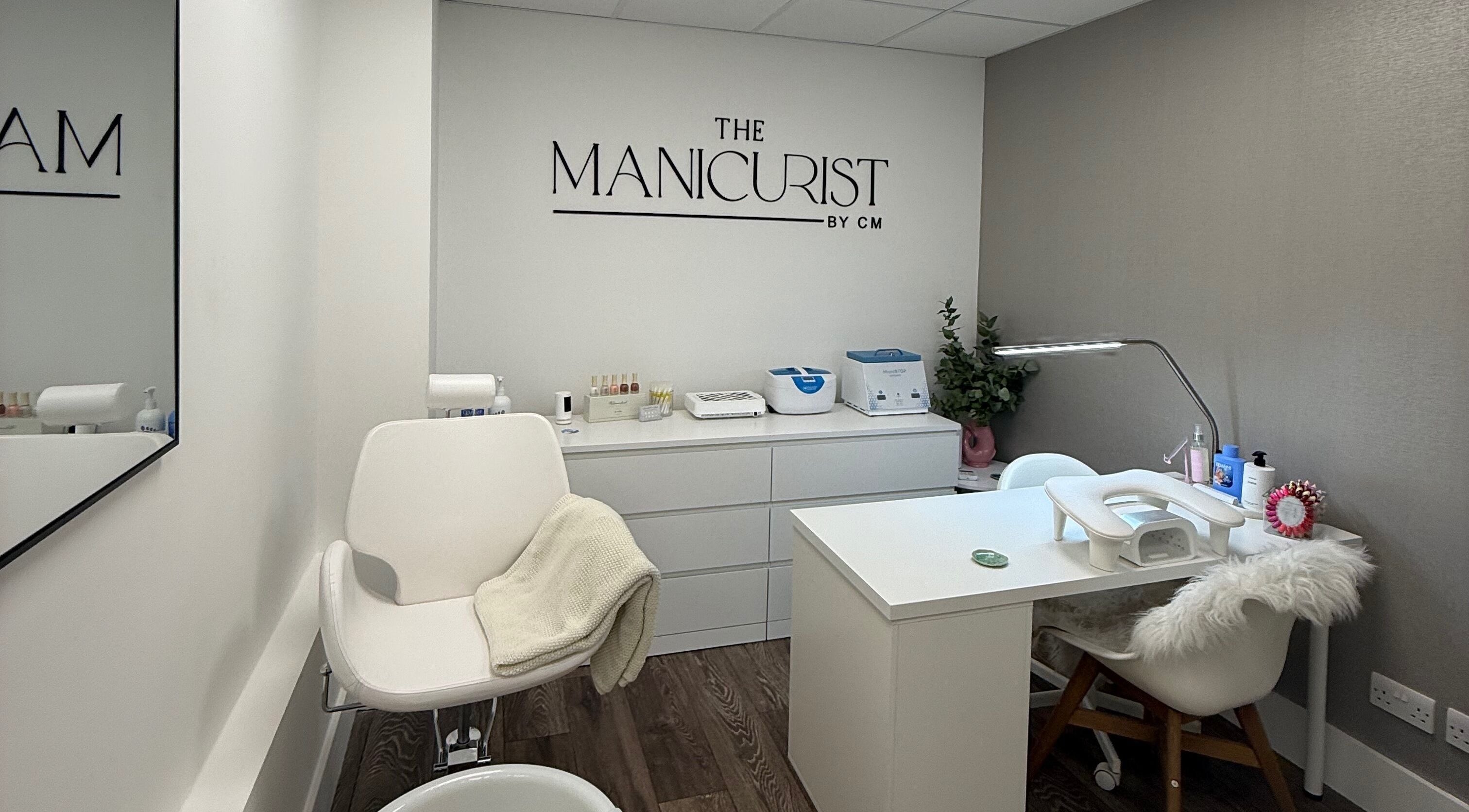 Chic salon setup at The Manicurist by CM in London, England, GB, featuring sleek furnishings and manicure tools.