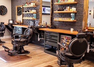 Stylish barber chairs at Kool Kidz, Laurel, Maryland, US showcasing sleek interiors and modern design.