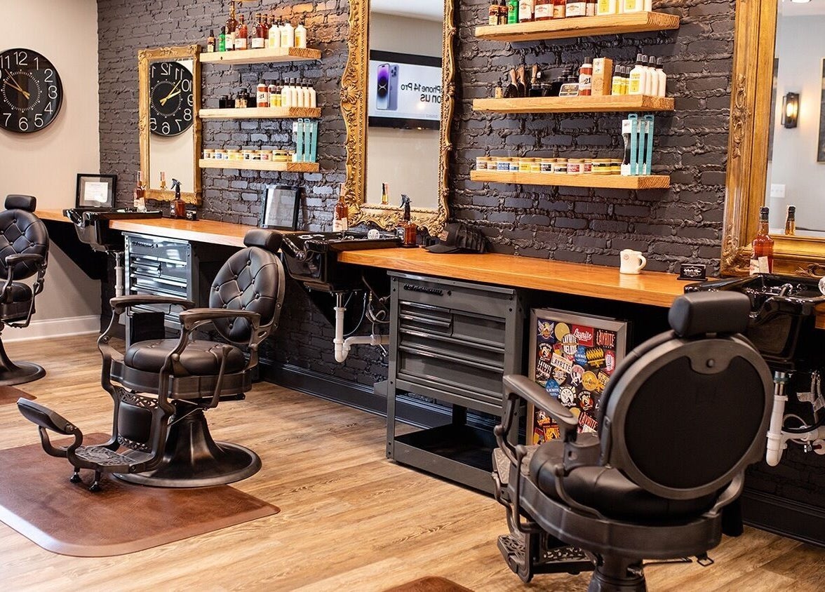 Stylish barber chairs at Kool Kidz, Laurel, Maryland, US showcasing sleek interiors and modern design.