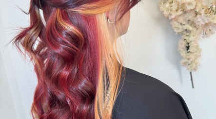 Vibrant red and copper curls styled at Beautiful Day Hair by Laila Day, Felixstowe, England, GB.