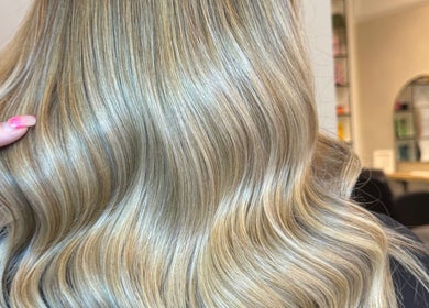 Lustrous blonde hair styled in soft waves at Beautiful Day Hair by Laila Day, Felixstowe, England, GB.