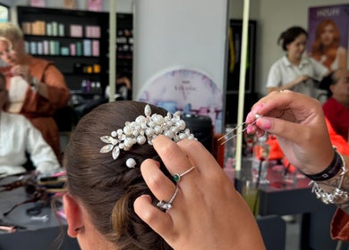 Elegant bridal hairstyle with pearl accessory at Beautiful Day Hair by Laila Day, Felixstowe, England, GB.