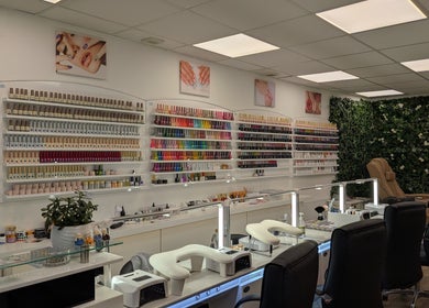 Interior view of Diamond Nails Grantham showcasing a vibrant nail polish display, Grantham, England, GB.