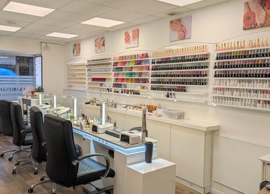 A vibrant interior of Diamond Nails Grantham in Grantham, England, GB, showcasing an extensive nail polish collection.