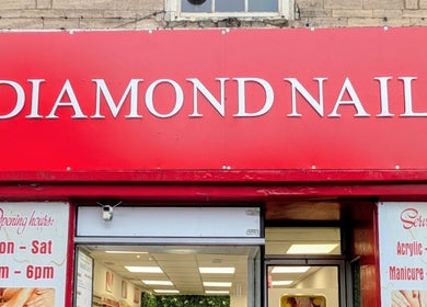 Front entrance of Diamond Nails Grantham, located in Grantham, England, GB, showcasing service offerings and hours.