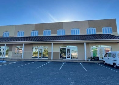 The elegant exterior of Licithestylist in Freeport, BS showcases a modern and welcoming beauty and wellness venue.