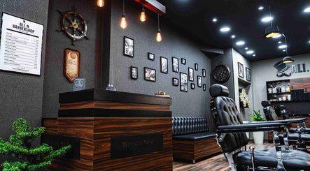 Chic interior of Ali N Barbershop at Den Haag, Zuid-holland, NL with modern decor and barber chairs.
